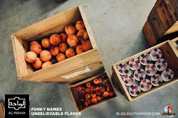 Crates of peaches and Amor Al-Waha Tobacco Peach Chill Flavor