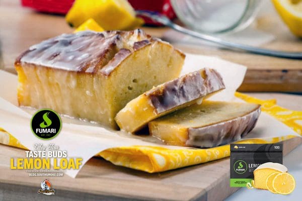 iced lemon loaf cake on cutting board - Fumari Tobacco Lemon Loaf shisha review