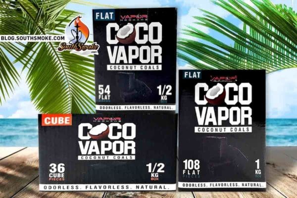 CocoVapor Hookah Charcoal Boxes on a table with a beach and palm tree background