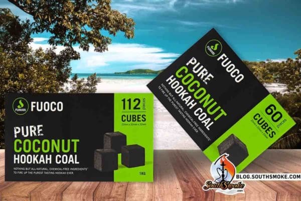 Fumari Fuoco Coconut Charcoal Cubes in both 60 Piece and 112 Pieces on a beach background