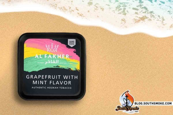 Al-Fakher Grapefruit with mint flavor shisha on beach sand with ocean water