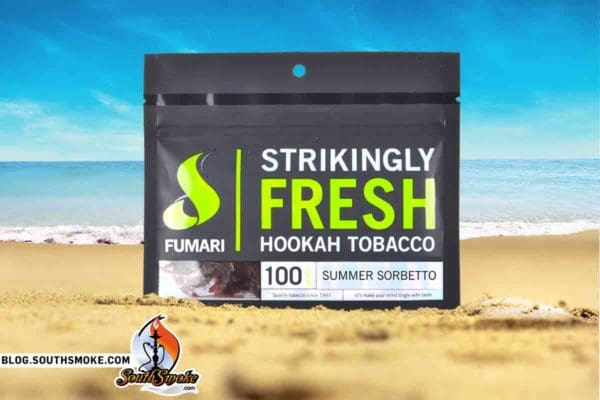 Fumari Summer Sorbetto Shisha Pouch on a sandy beach