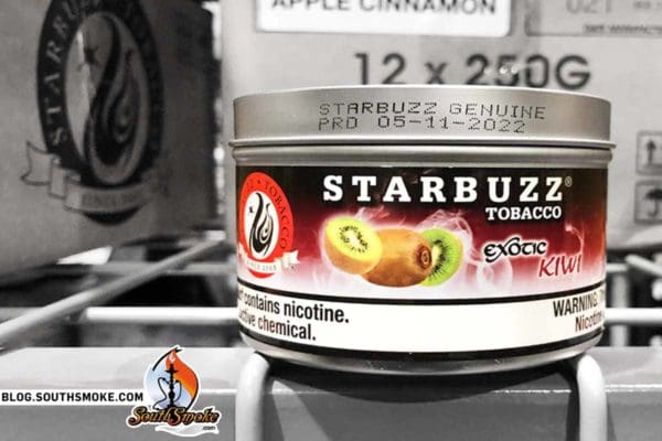 Starbuzz Exotic Kiwi Shisha Tin showing its production marking on a warehouse shelf