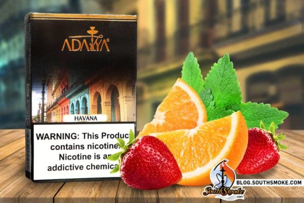 Adalya's Havana 50g Pack on a table with an Orange, Strawberries and Mint